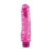 A pink plastic dildo on a white background.