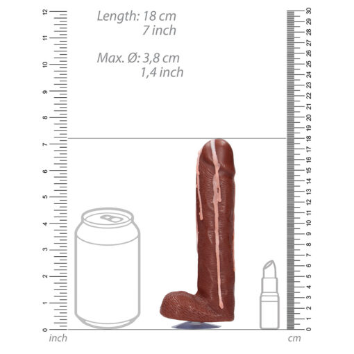 A picture of a dildo with a ruler next to it.