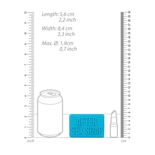 A ruler with a ruler and a can of soda.