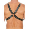 The back view of a man wearing a black leather harness.