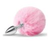 A pink furry ball with a silver spike on it.