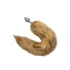 A fox tail with a hook on it.