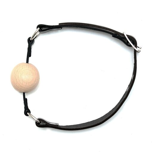 A leather bracelet with a wooden ball on it.