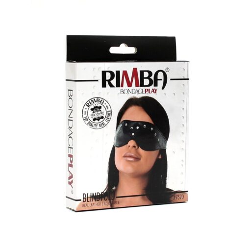 A black eye mask with a woman's face on it.