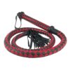 A red and black braided whip with tassels.