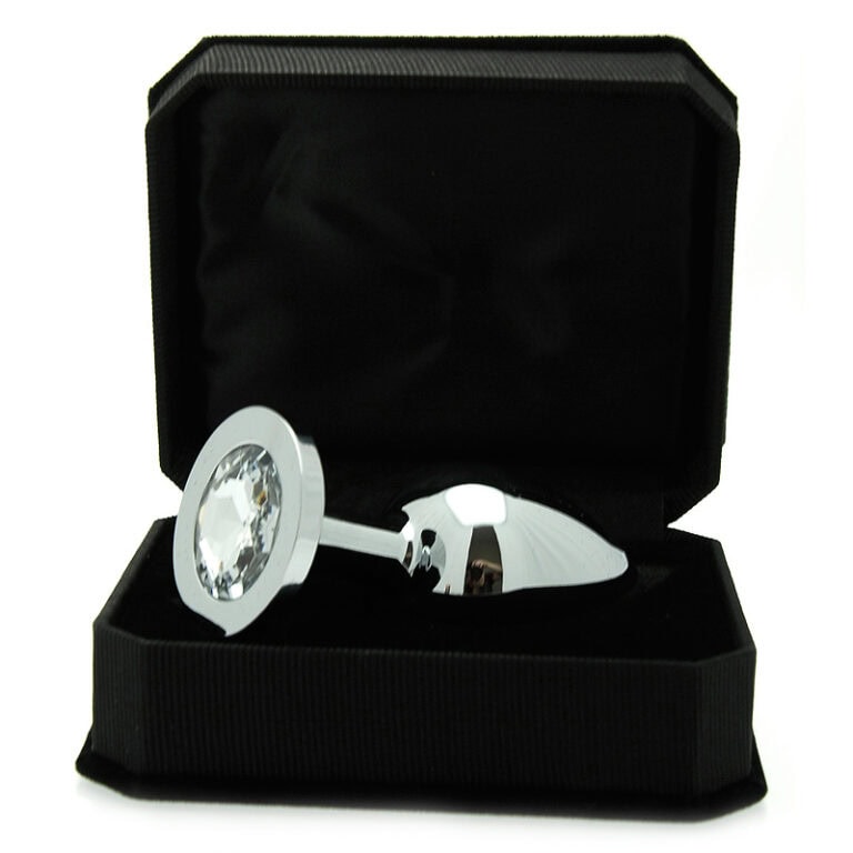 An SEO-friendly ALT tag for this image could be: "Luxury silver anal plug with crystal detail, perfect for adult pleasure and intimate toy collection.".
