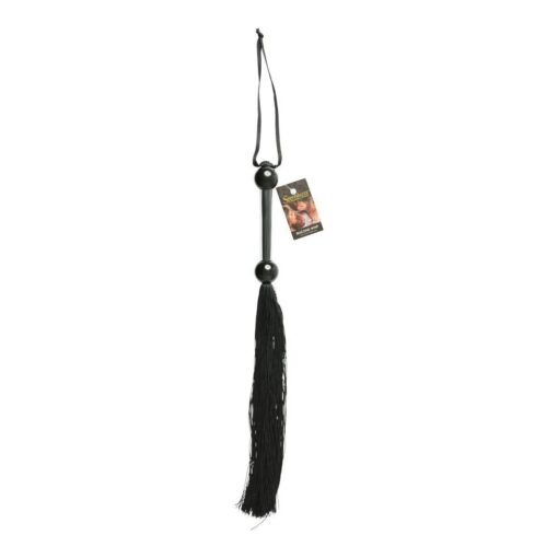 A black tassel hanging on a white background.